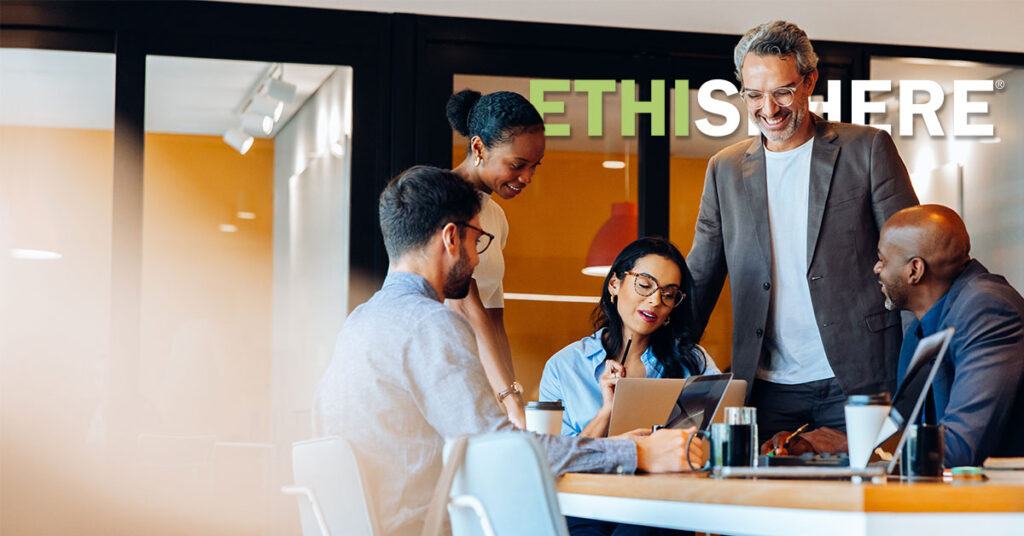 A diverse group of professionals discussing ideas around a table