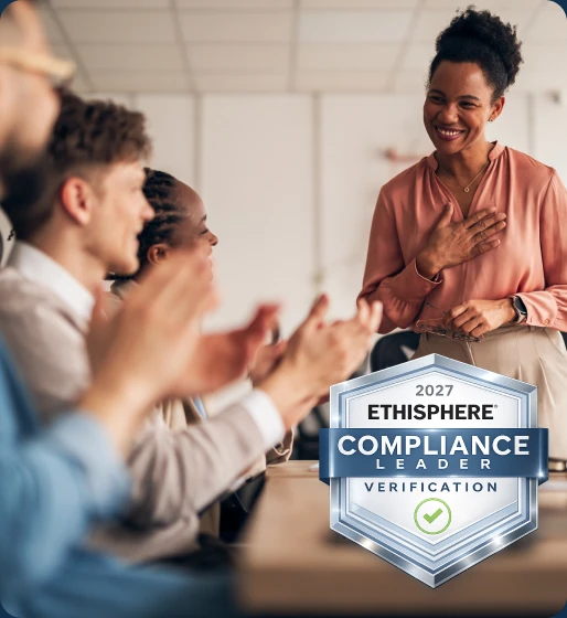 Team celebrating Compliance Leader Verification